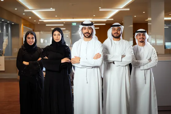 Group of Emirati professionals in a business meeting
